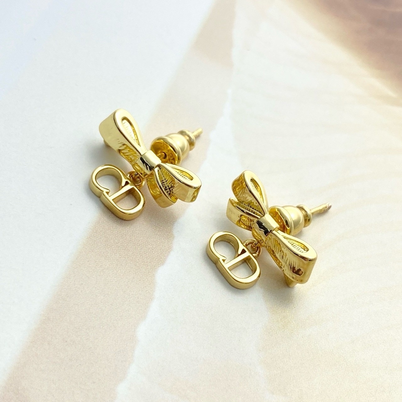 18k Dr”26s金絲緞帶蝴蝶結CD”立體高奢定製耳墜