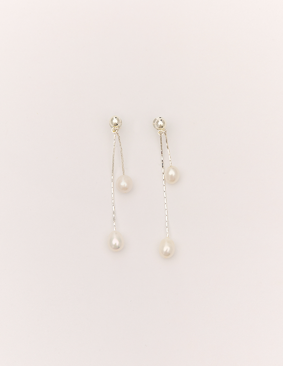 珍珠流蘇兩戴式。針式耳環