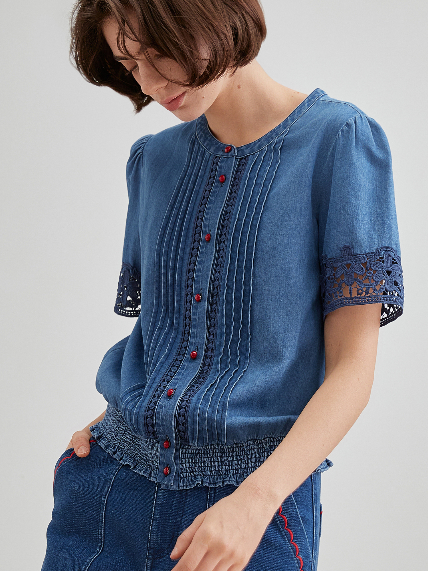 mi-tu lace-trimmed denim top