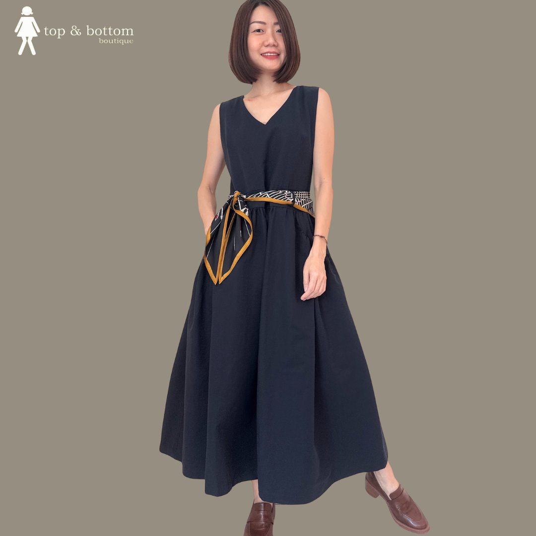 SLEEVELESS BELTED LONG DRESS