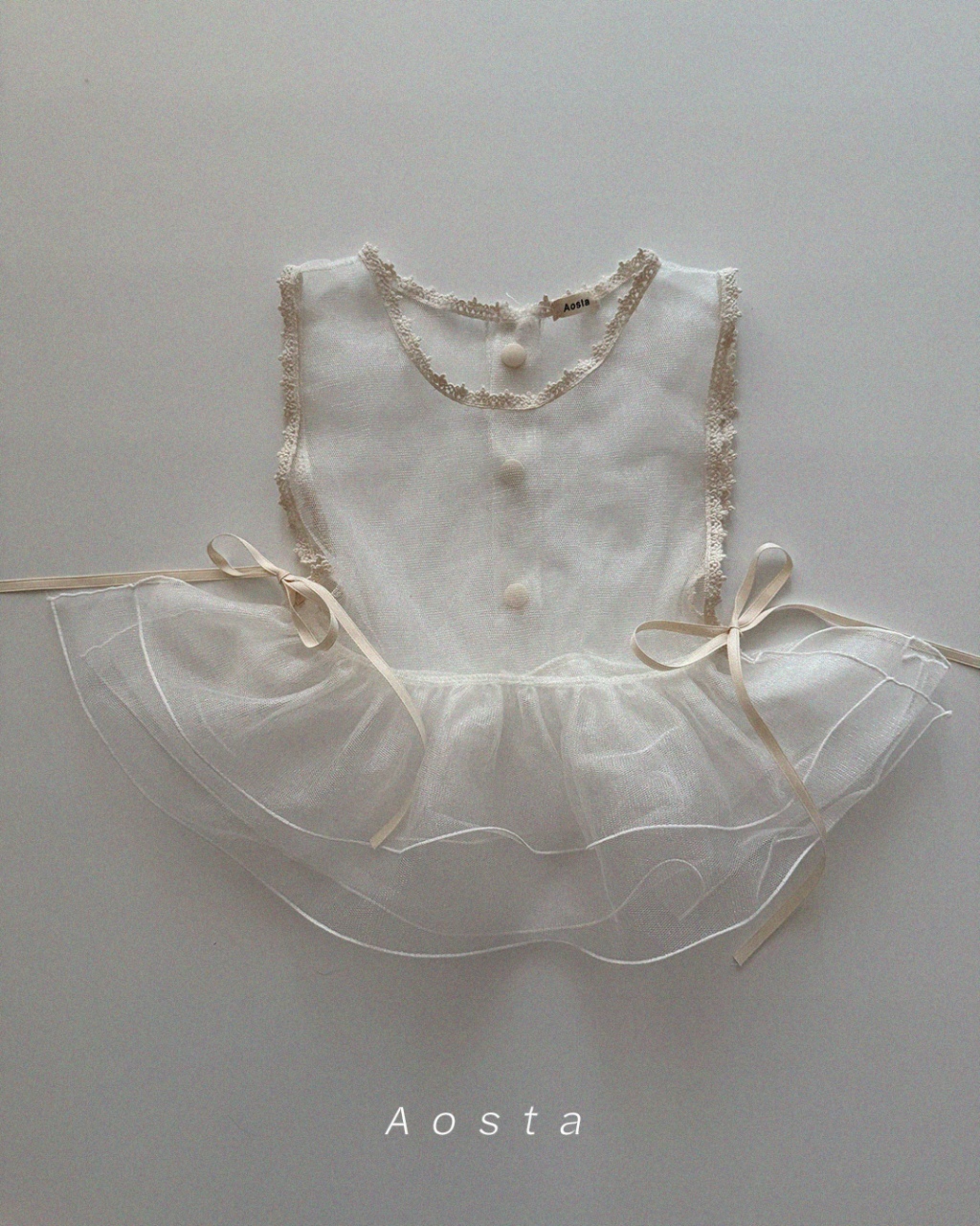 韓國🇰🇷Aosta 後扣側蝴蝶結罩衫(Freesize)