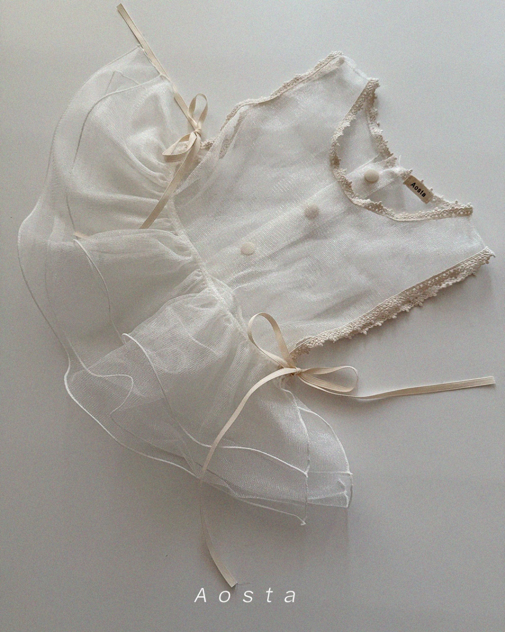 韓國🇰🇷Aosta 後扣側蝴蝶結罩衫(Freesize)