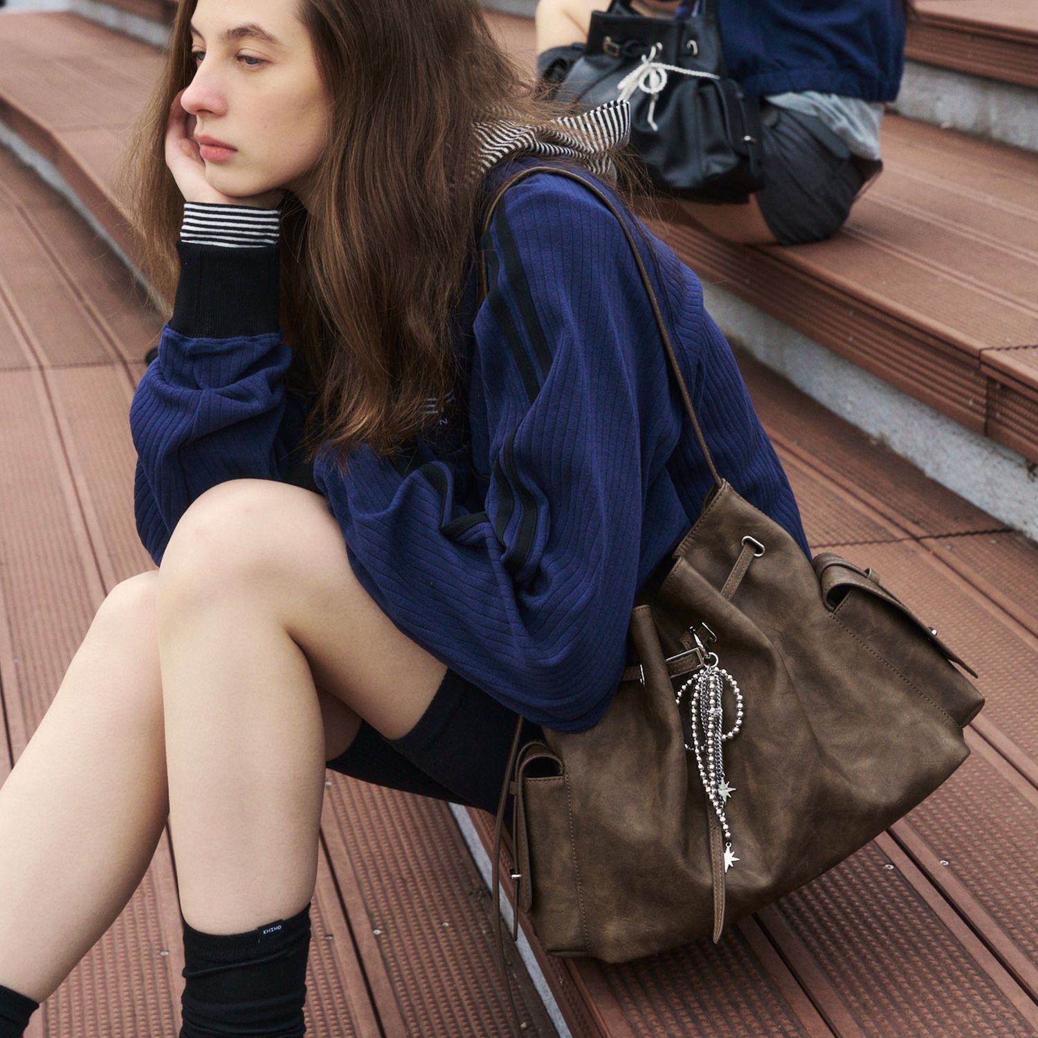 KHIHO MILA BELTED BUCKET BAG