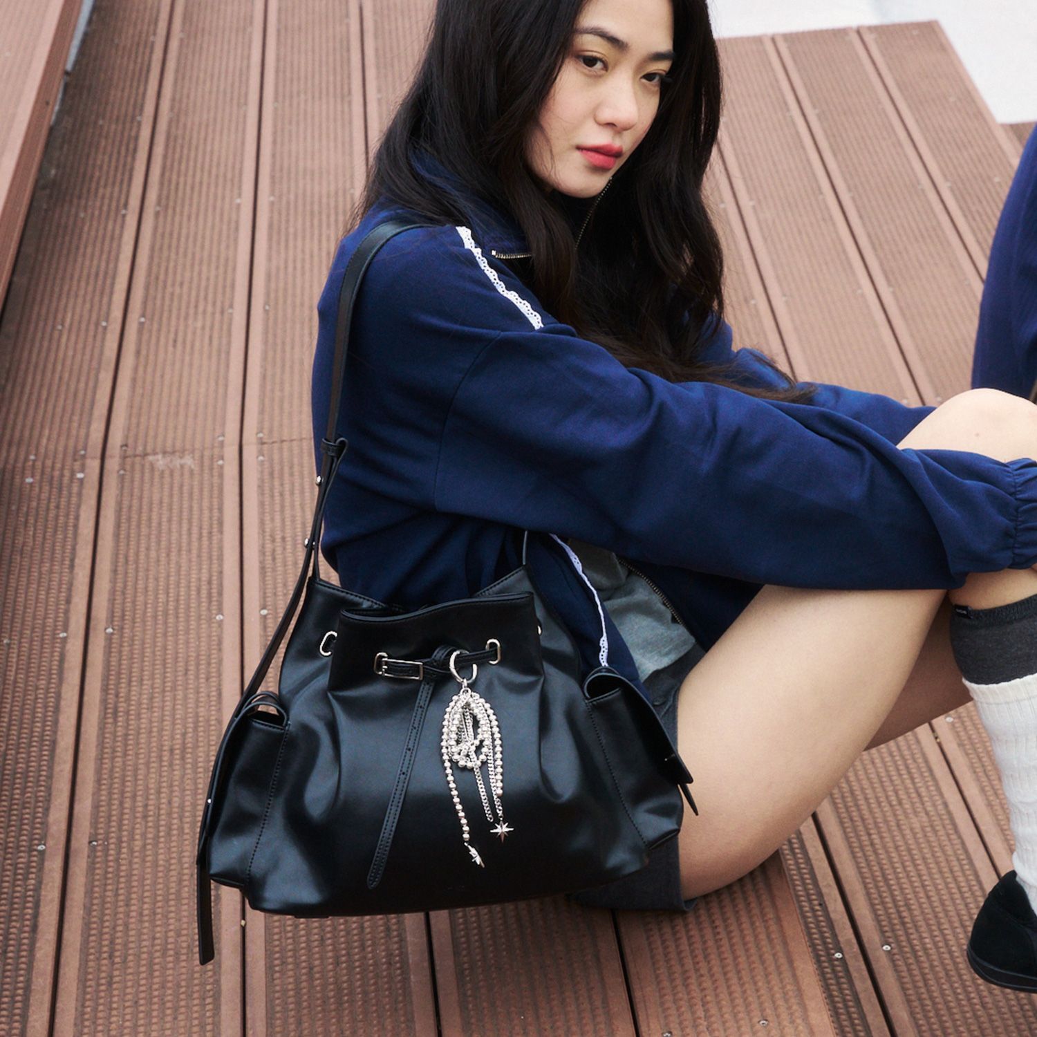 KHIHO MILA BELTED BUCKET BAG