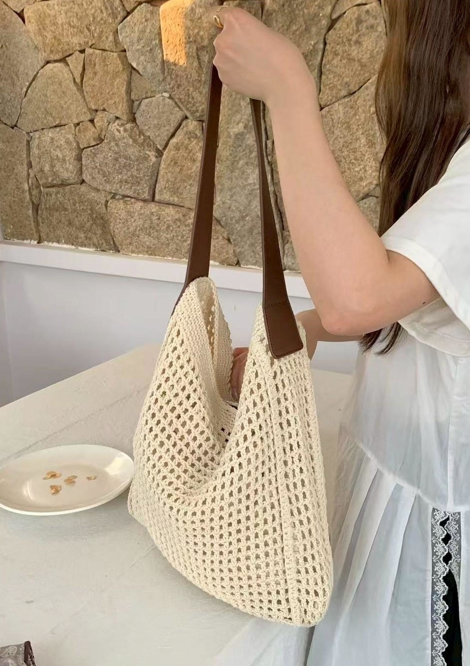 皮革肩帶吸釦洞洞編織包