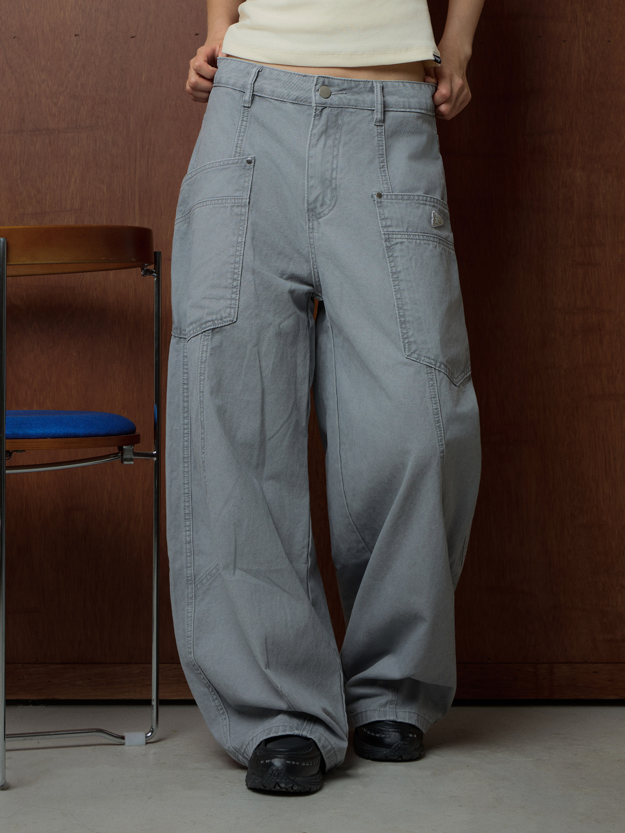 前口袋寬鬆彎刀褲