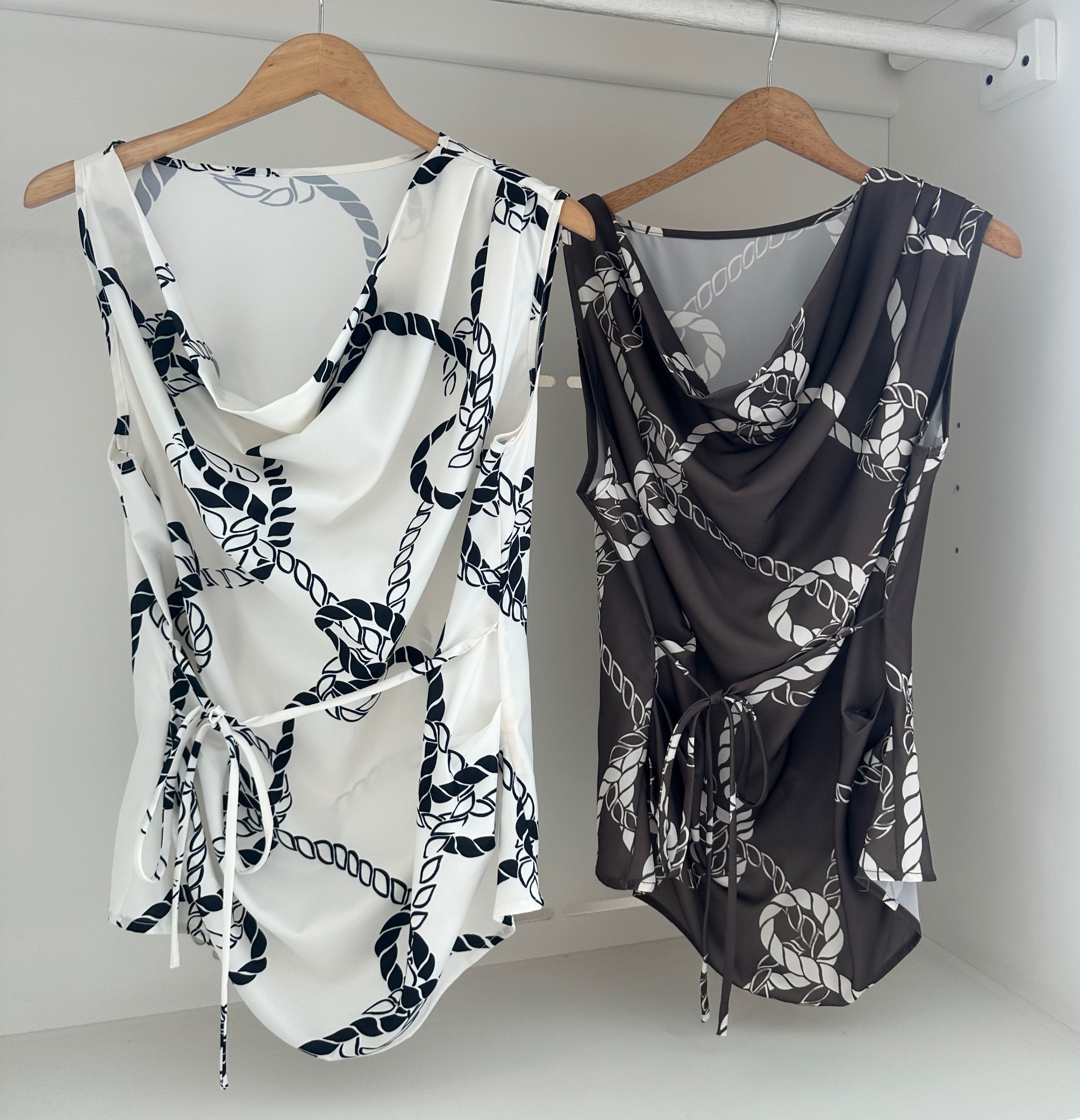 SLEEVELESS PRINTED COWL NECK BLOUSE