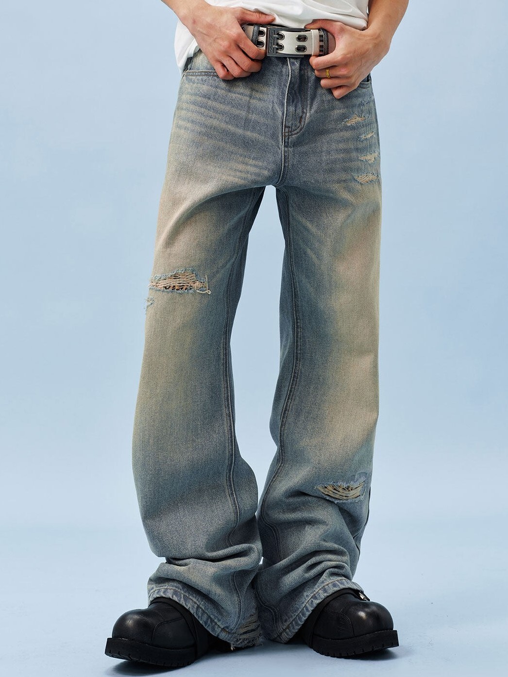 MEDM leopard print leather label, washed distressed and ripped, slightly flared jeans.