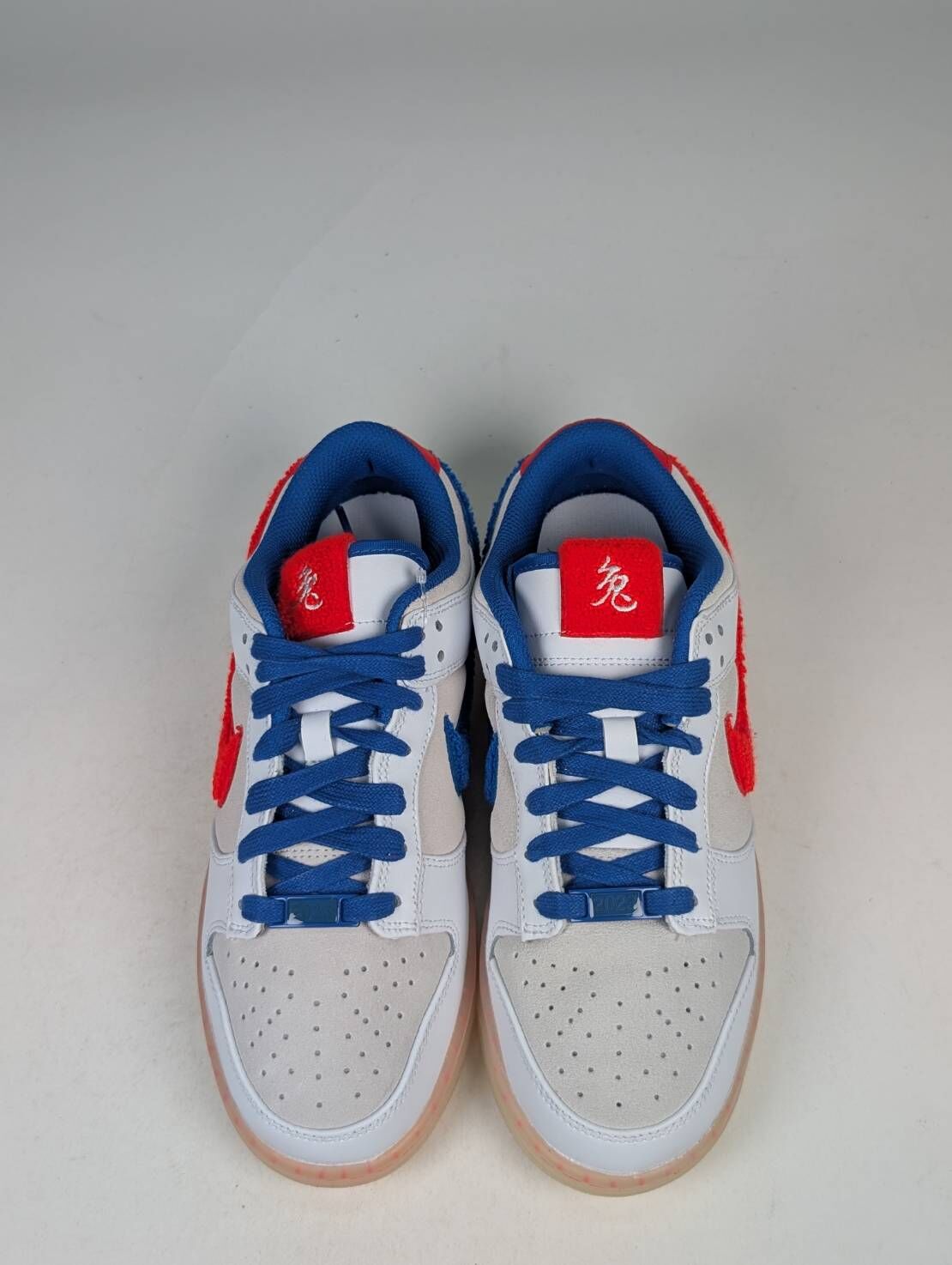 微瑕疵-鞋帶扣環和鞋底泛黃 FD4203-161/7 Nike Dunk Low “Year Of The Rabbit”兔年 白藍紅 男