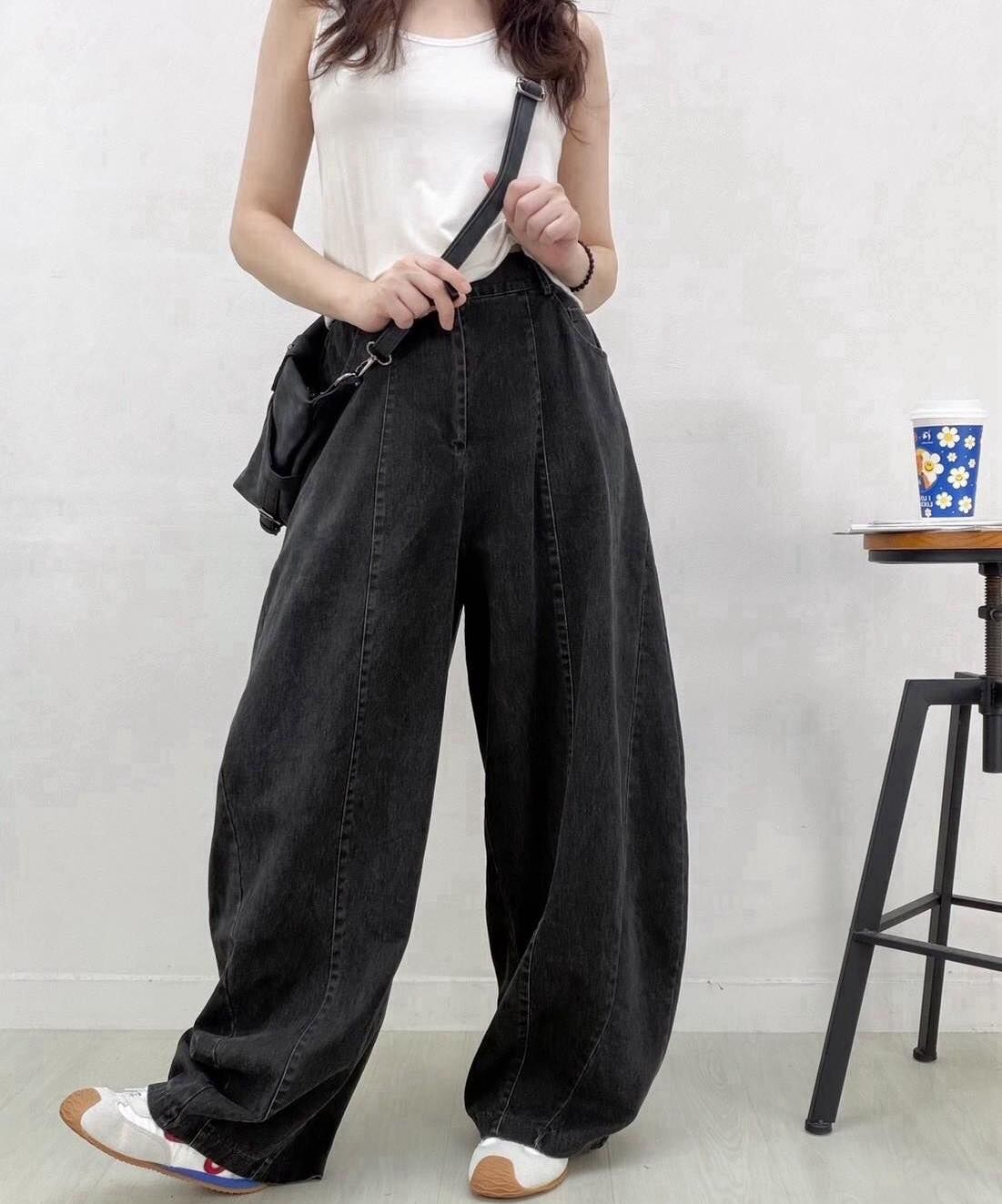 【修身腿長的復古感彎刀牛仔褲】（現貨）