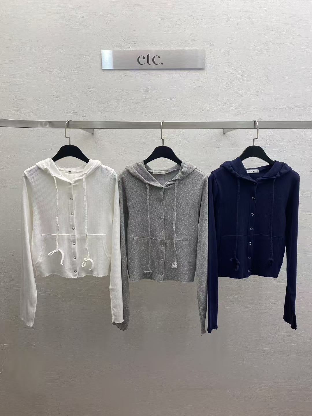 MK6122 連帽排扣外套