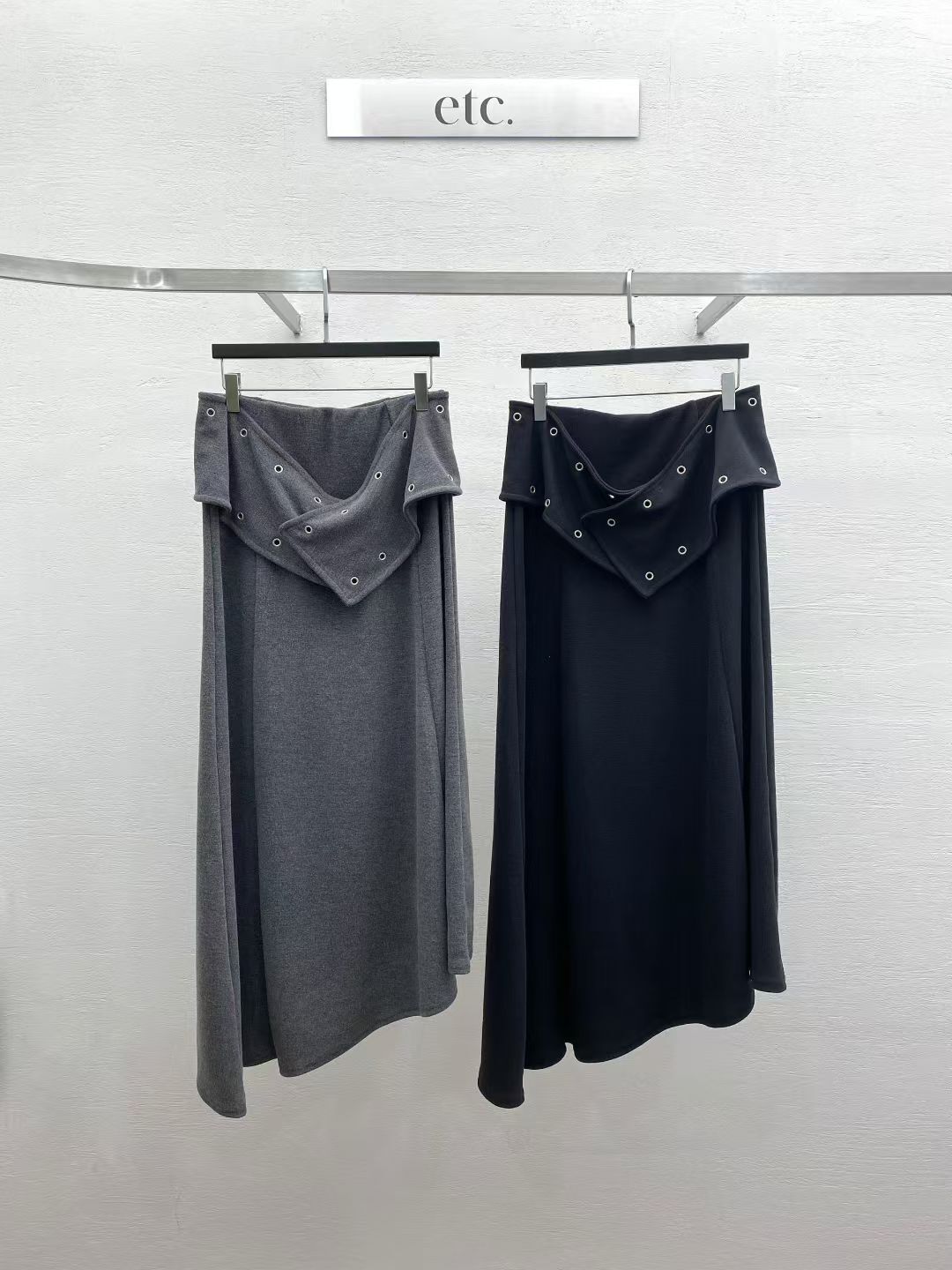 MK6125 鋼圈洞洞腰帶不規則長裙