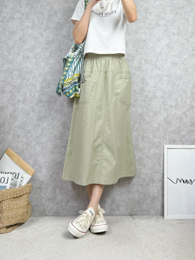 自然修飾臀腿線條的A字棉質長裙