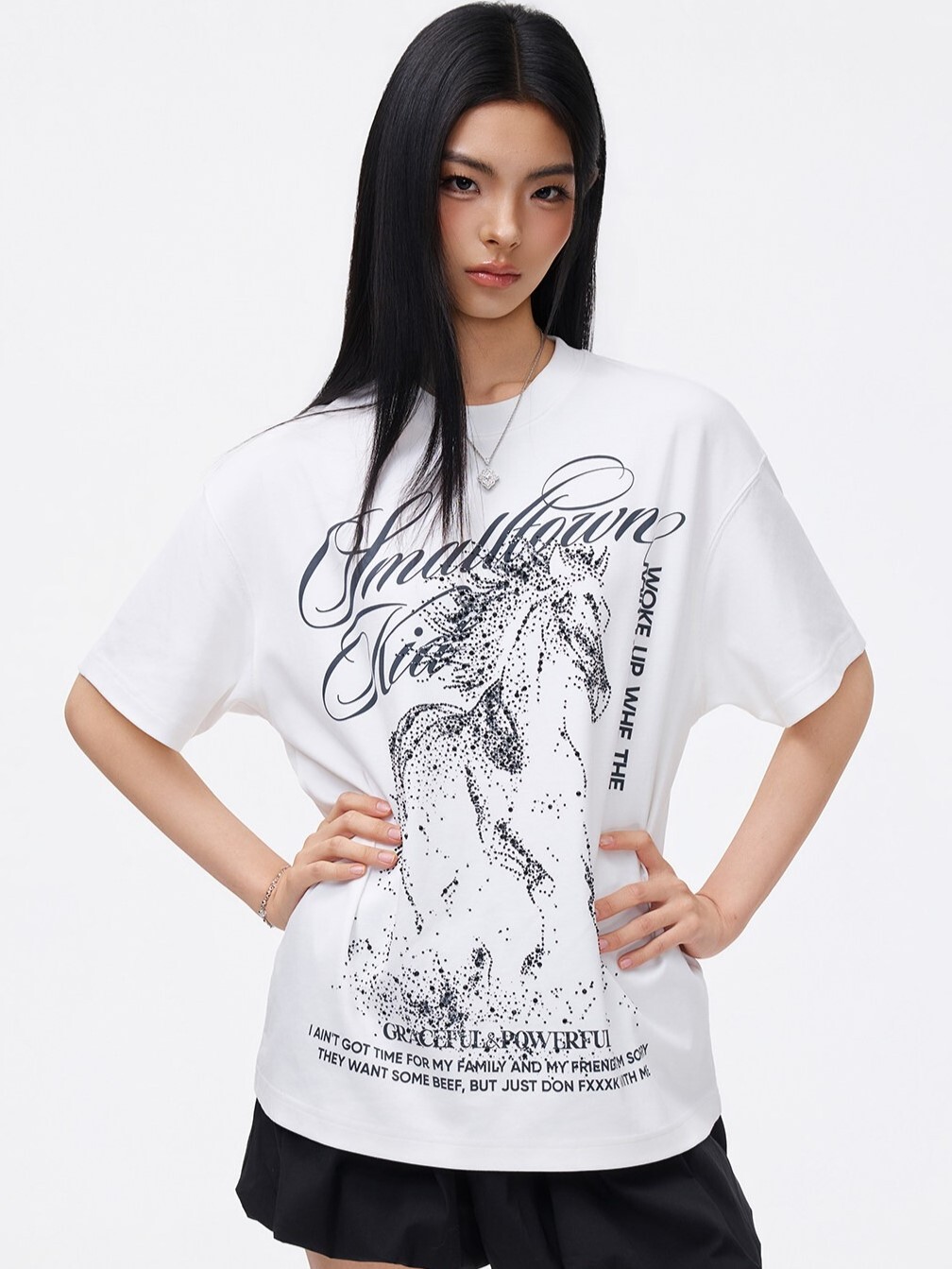 STK SmallTownKid cursive font logo with rhinestone Pegasus print on short-sleeved T-shirts.