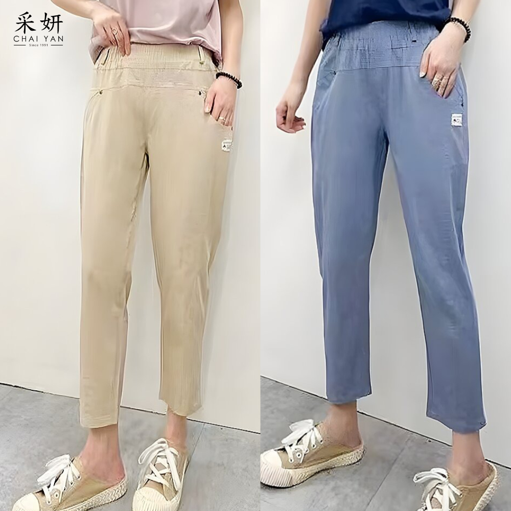 單側口袋小布標鬆緊腰頭錐形休閒長褲