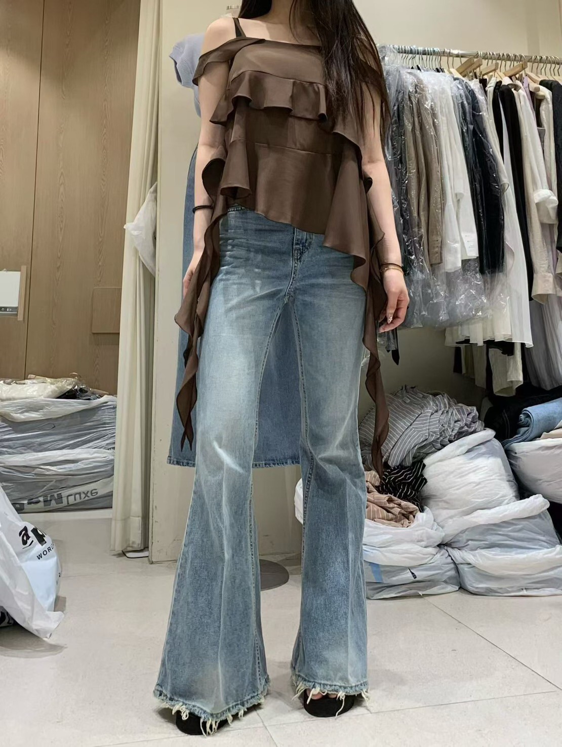 時髦感下擺抽鬚造型牛仔喇叭褲S-L