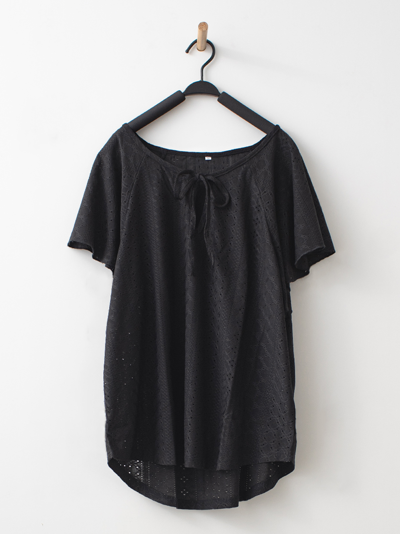 領口蝴蝶結簍空緹花寬鬆針織上衣