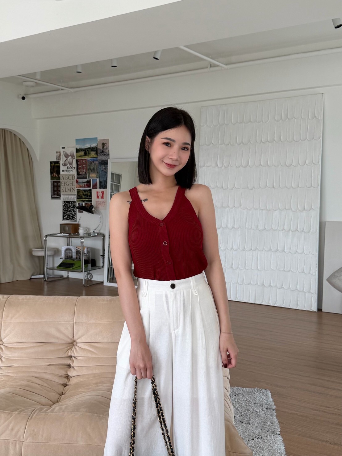 削肩坑條排釦針織背心