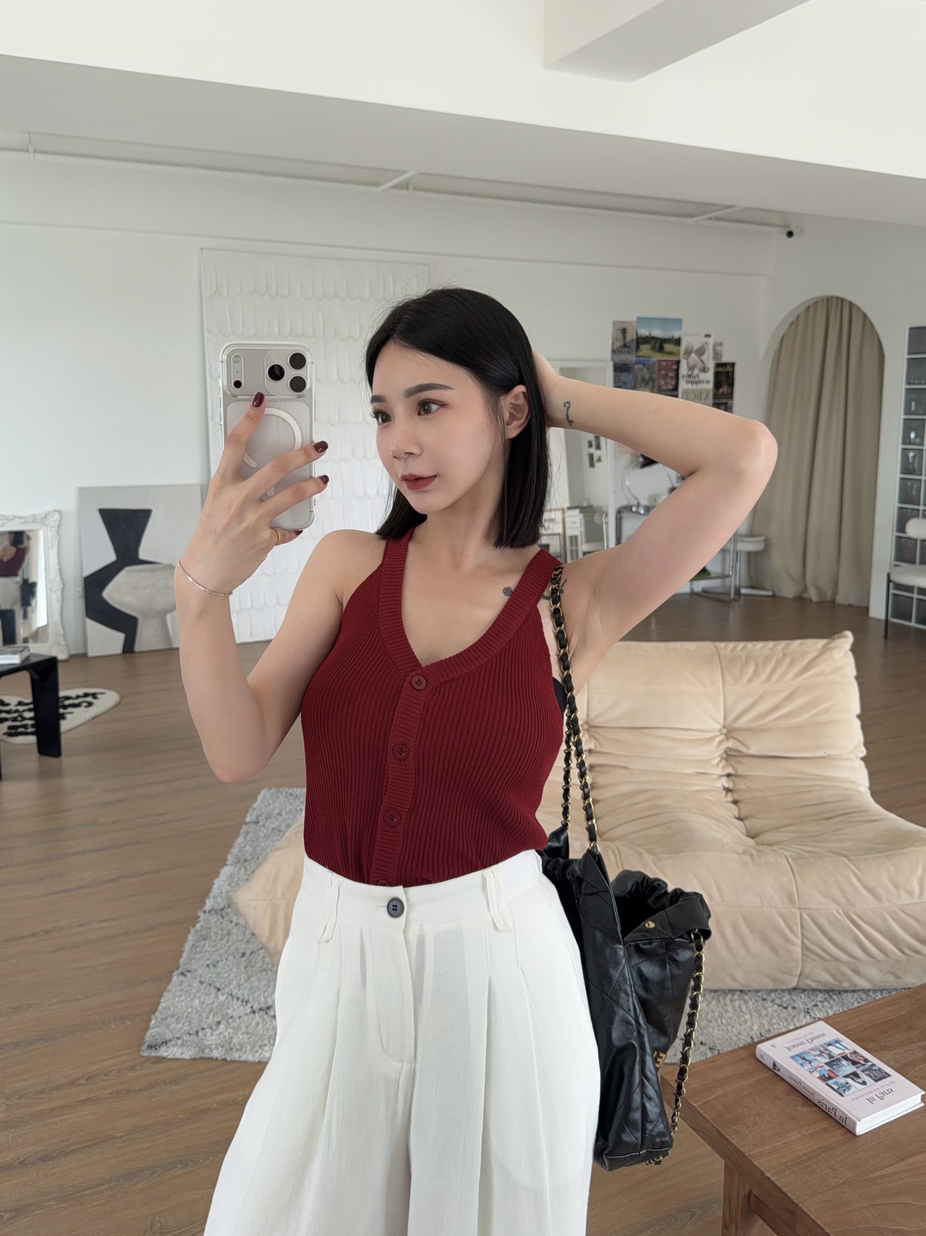 削肩坑條排釦針織背心