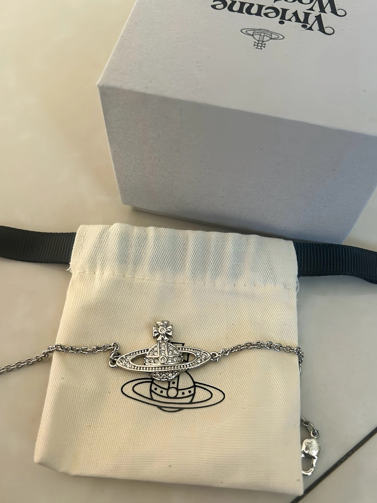 代購-Vivienne Westwood mini bas relief 水晶土星 手鍊