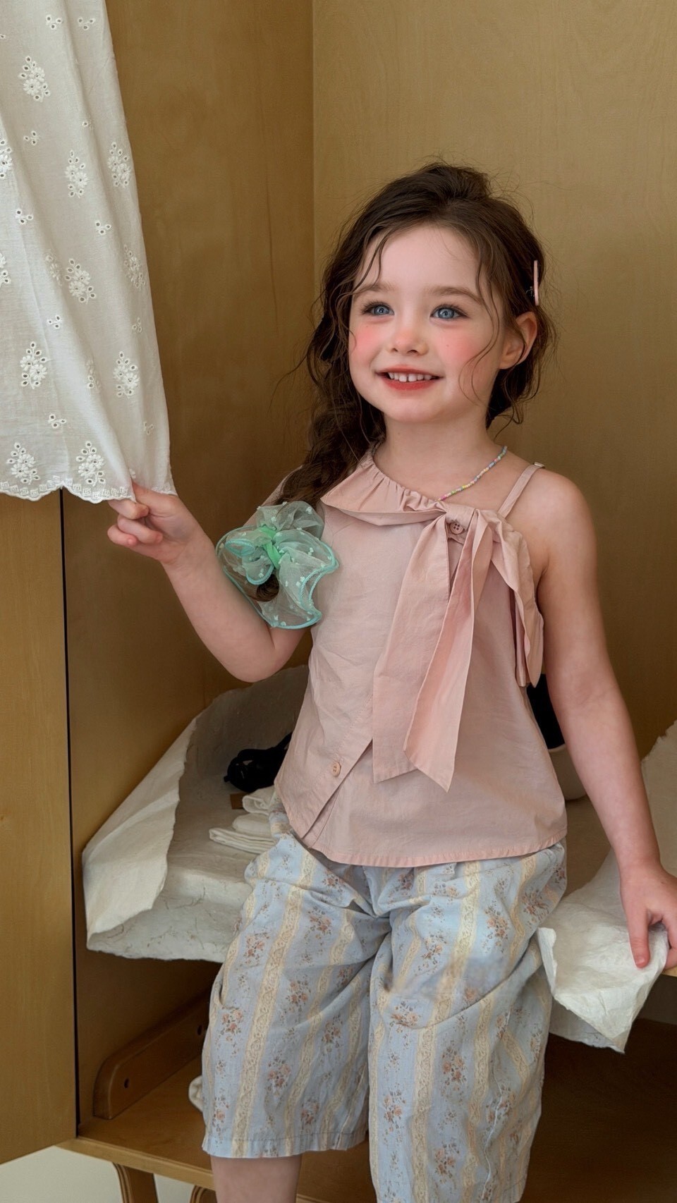 有點甜但不膩的蝴蝶結背心