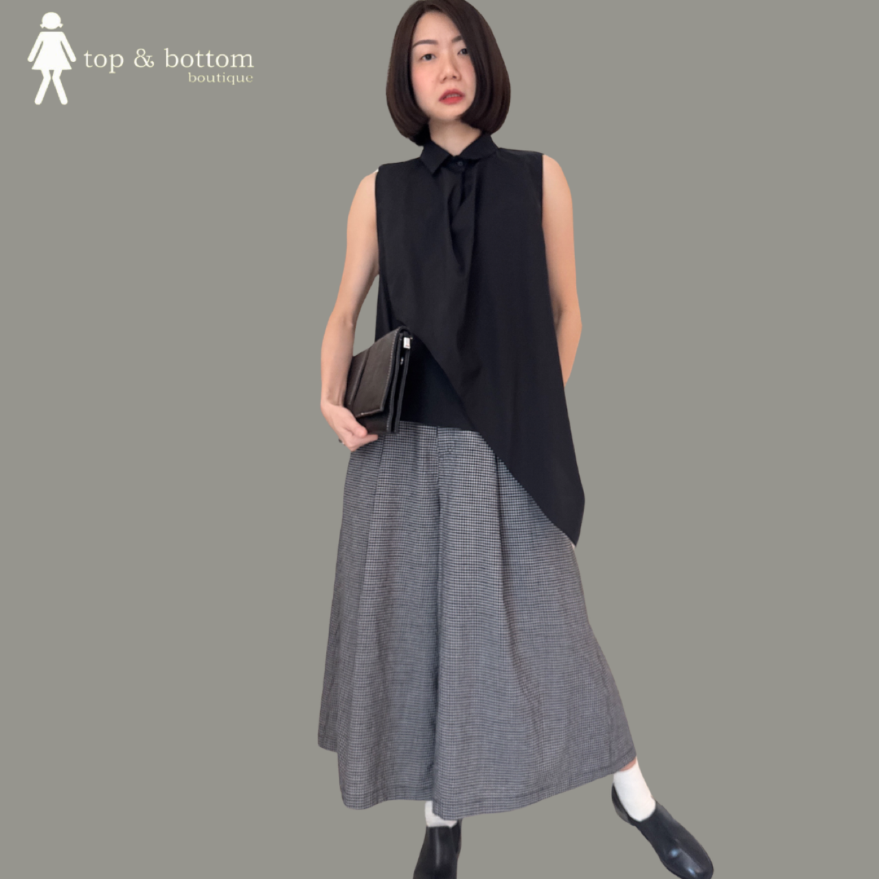 SLEEVELESS COTTON HIGH NECK ASYMMETRIC BLOUSE