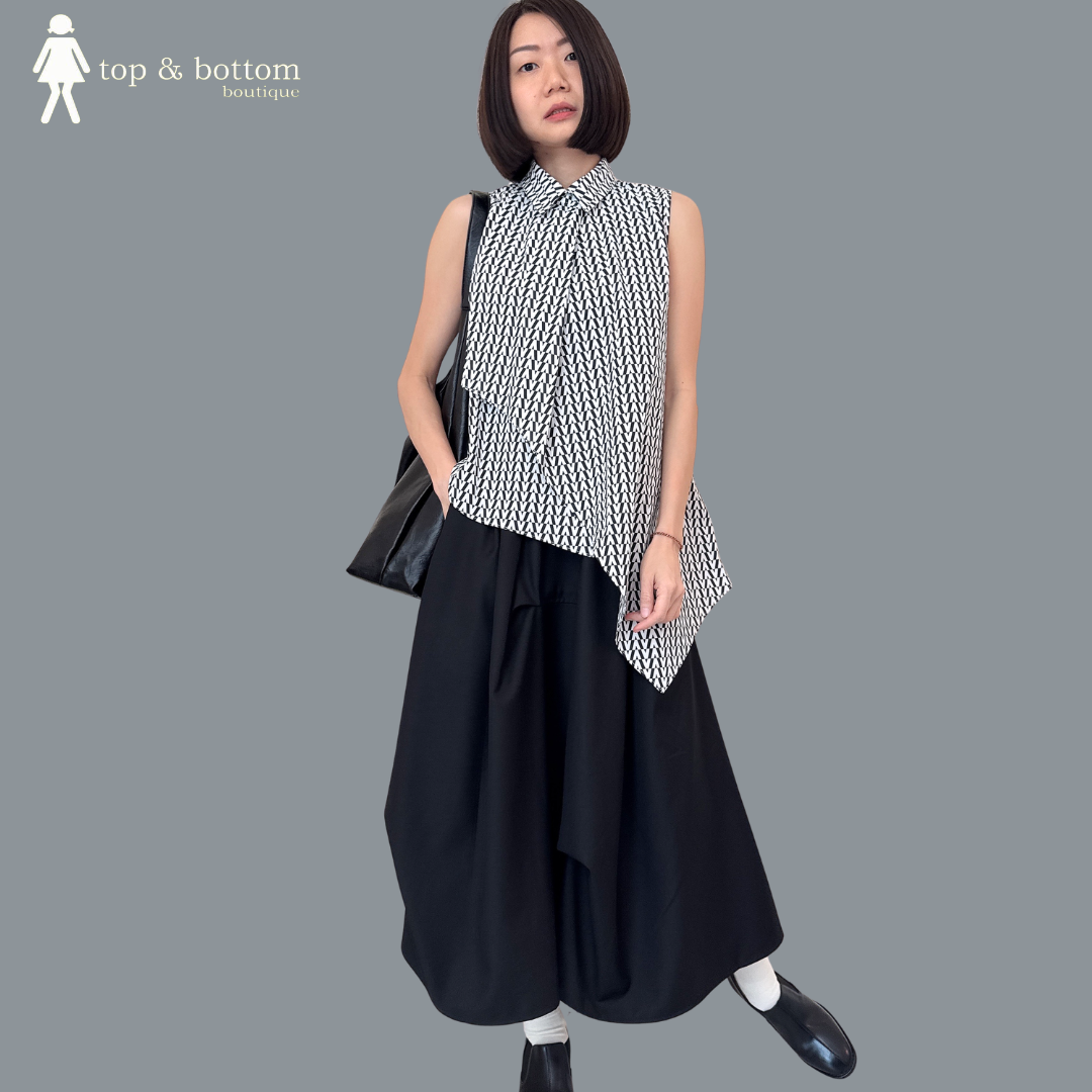 HIGH WAISTED ASYMMETRIC MIDI SKIRT