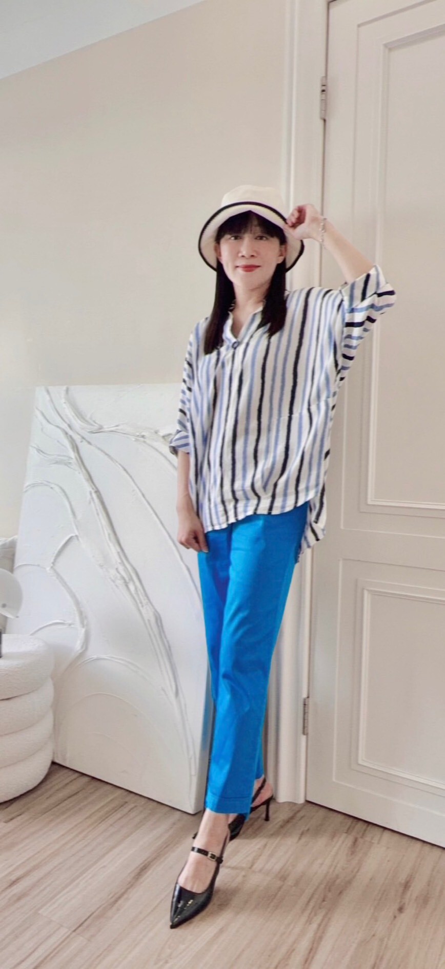 OL時尚剪裁前短後長修身八分褲Y6021