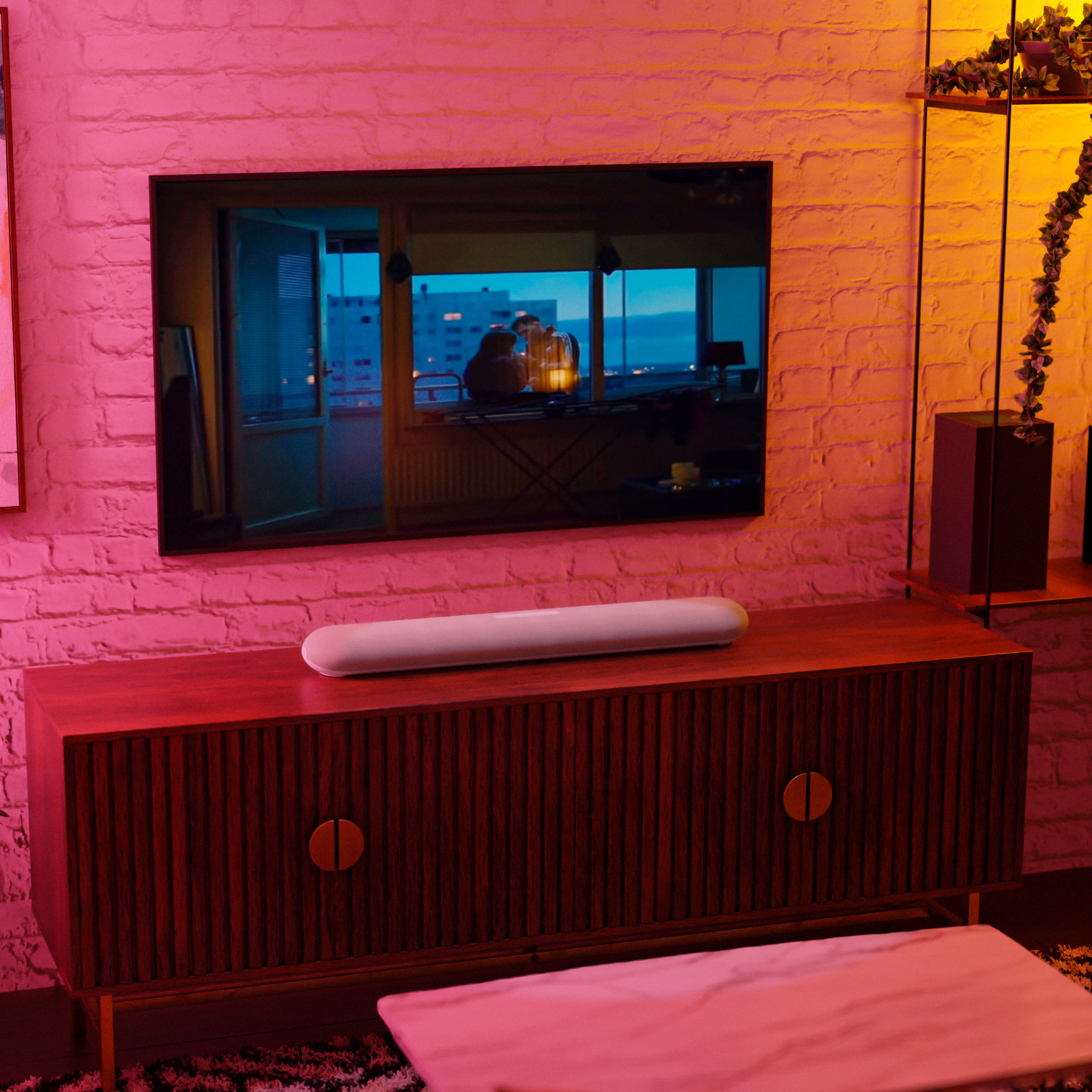 Bluesound PULSE CINEMA MINI Soundbar Tan on cabinet