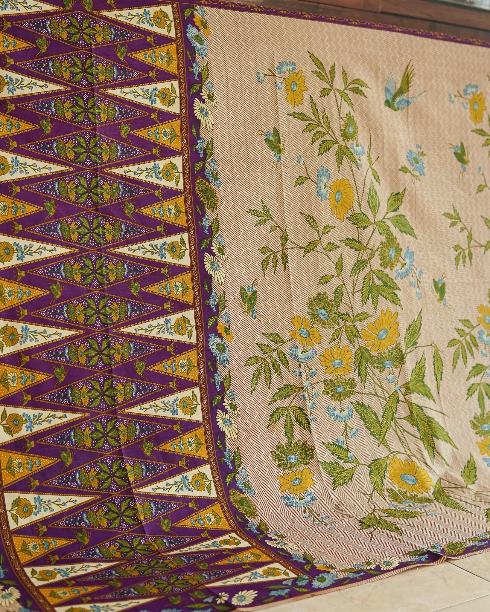 Batik｜Beige batik sarong with floral and bird motifs and tumpal pattern｜Indonesia