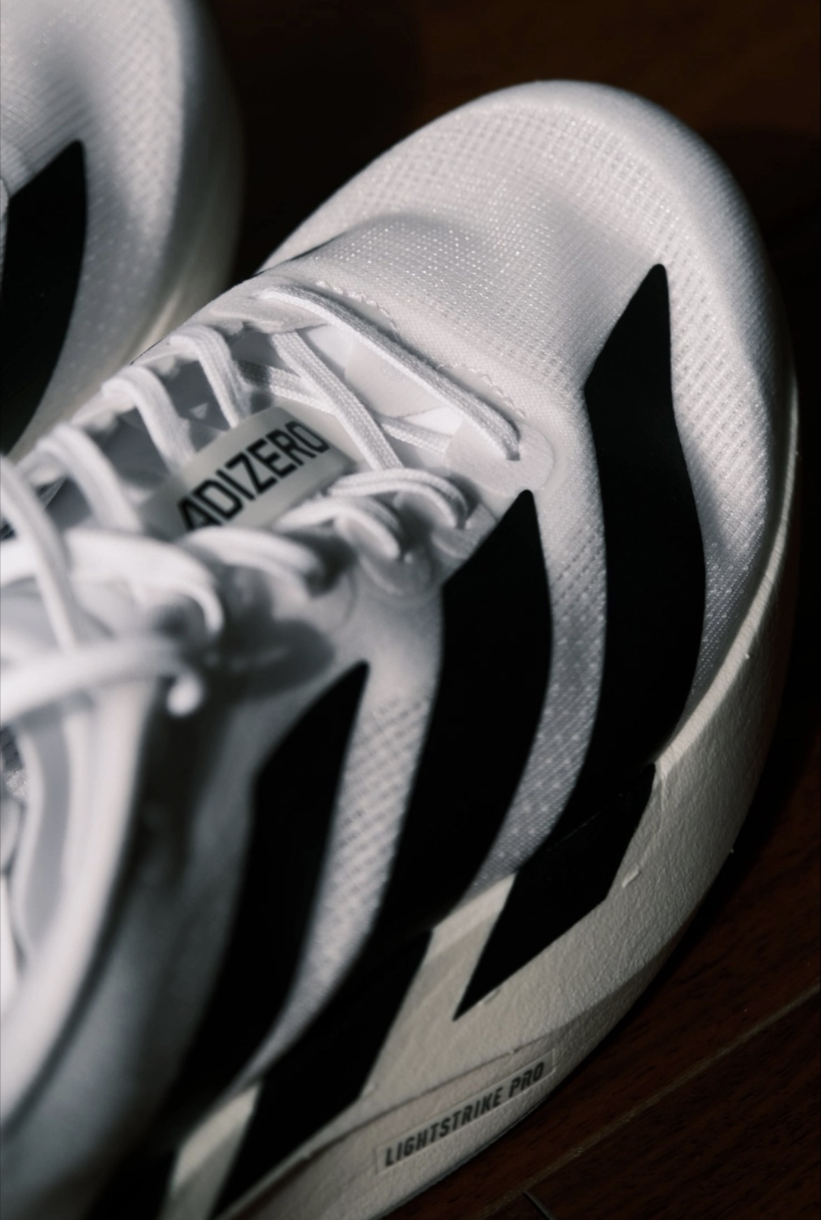 adidas Adizero Evo SL 運動舒適增高 低幫 馬拉松訓練競速跑步鞋 男款 白黑 JH6206