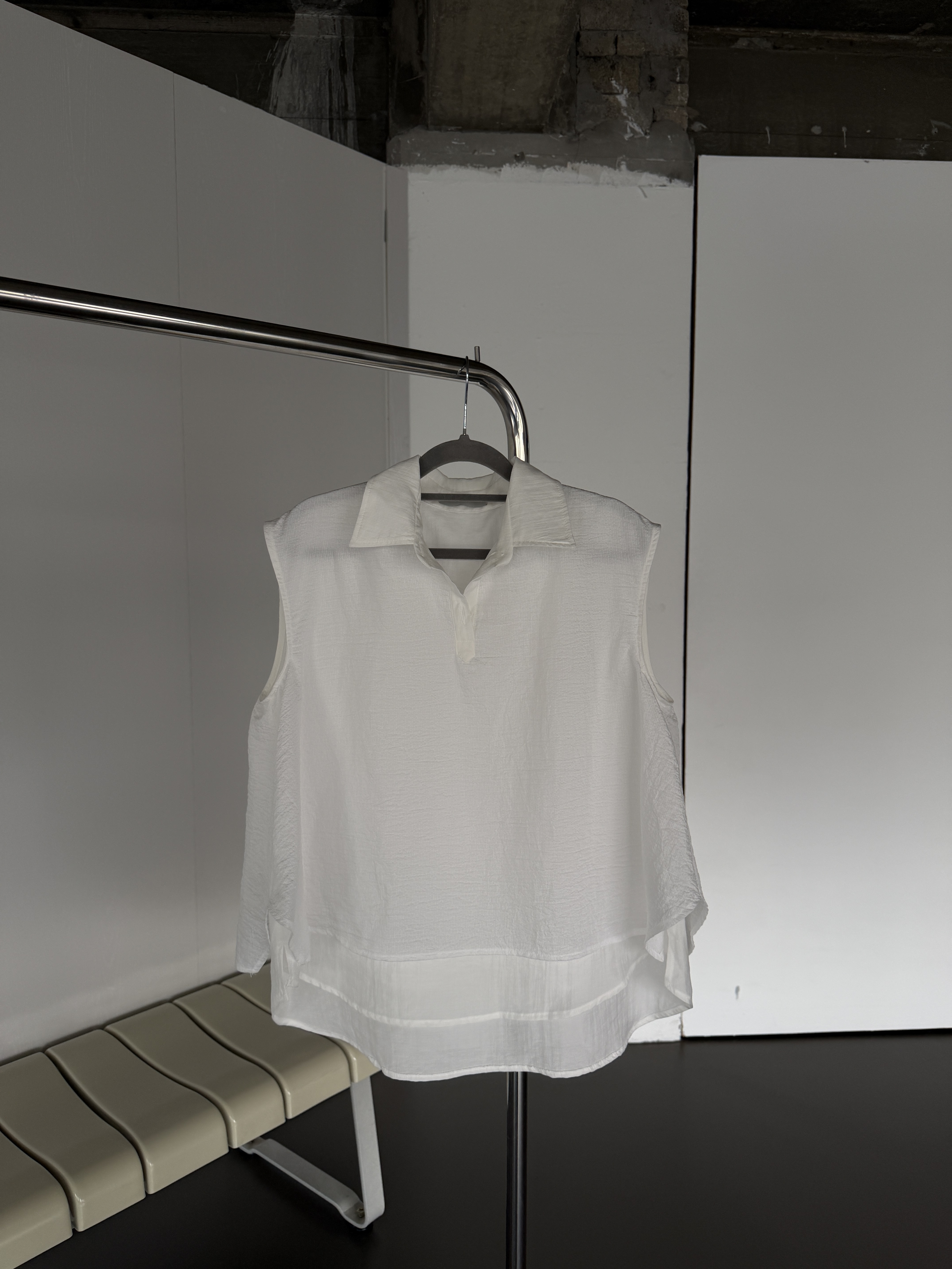 Double layered polo vest