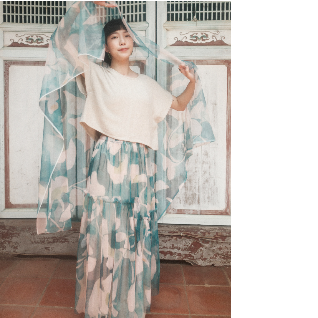 habit+ Stellar Flora Tulle Skirt, featuring hand-painted green ginkgo patterns for a delicate layered look.