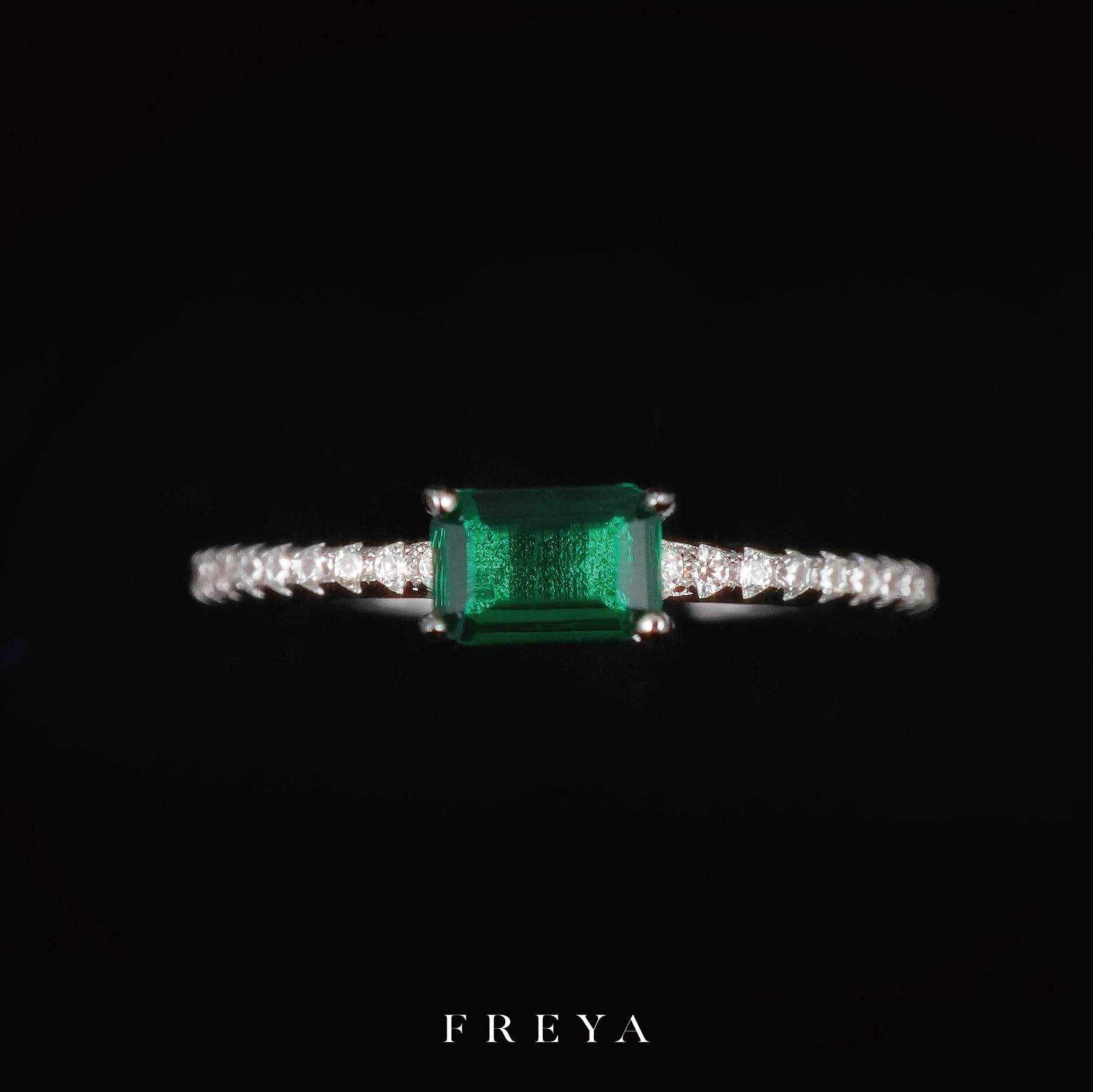 Emerald Solitaire Ring