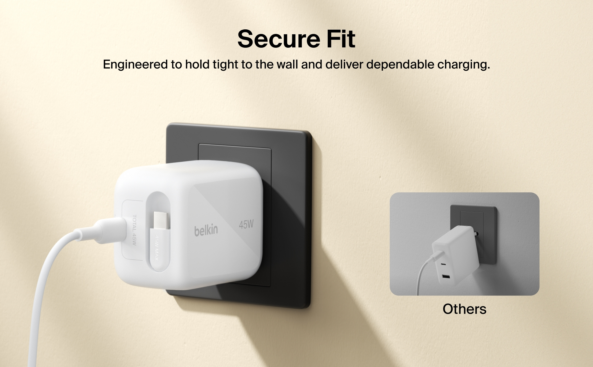 Belkin UltraCharge 45W GaN charger plugged into a wall outlet showing a secure fit.