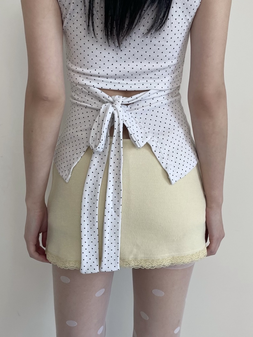 polka dot waist line with back tie vest