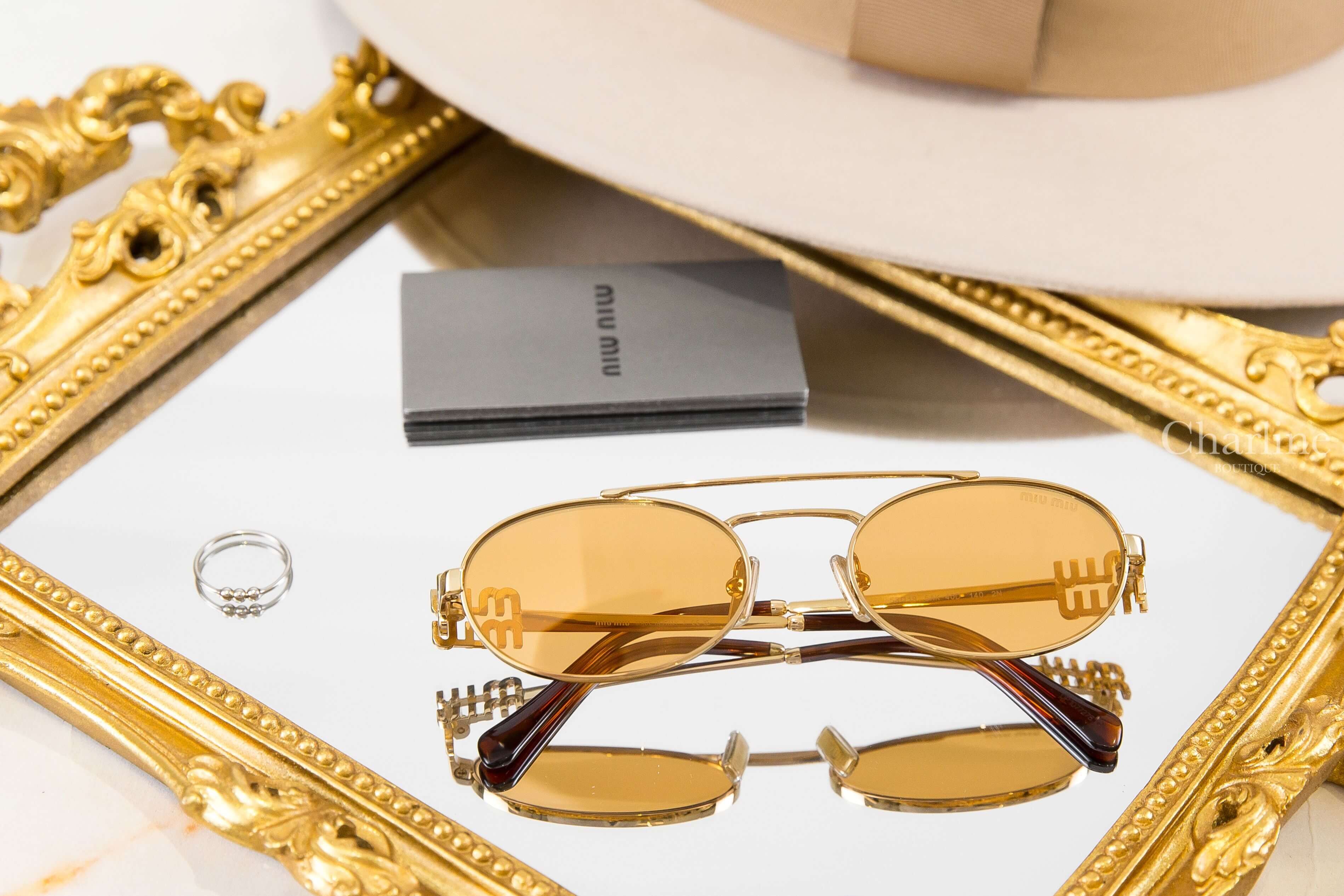 Miu Miu Sunglasses 金色橢圓框側邊金色字母琥珀色鏡腳太陽眼鏡