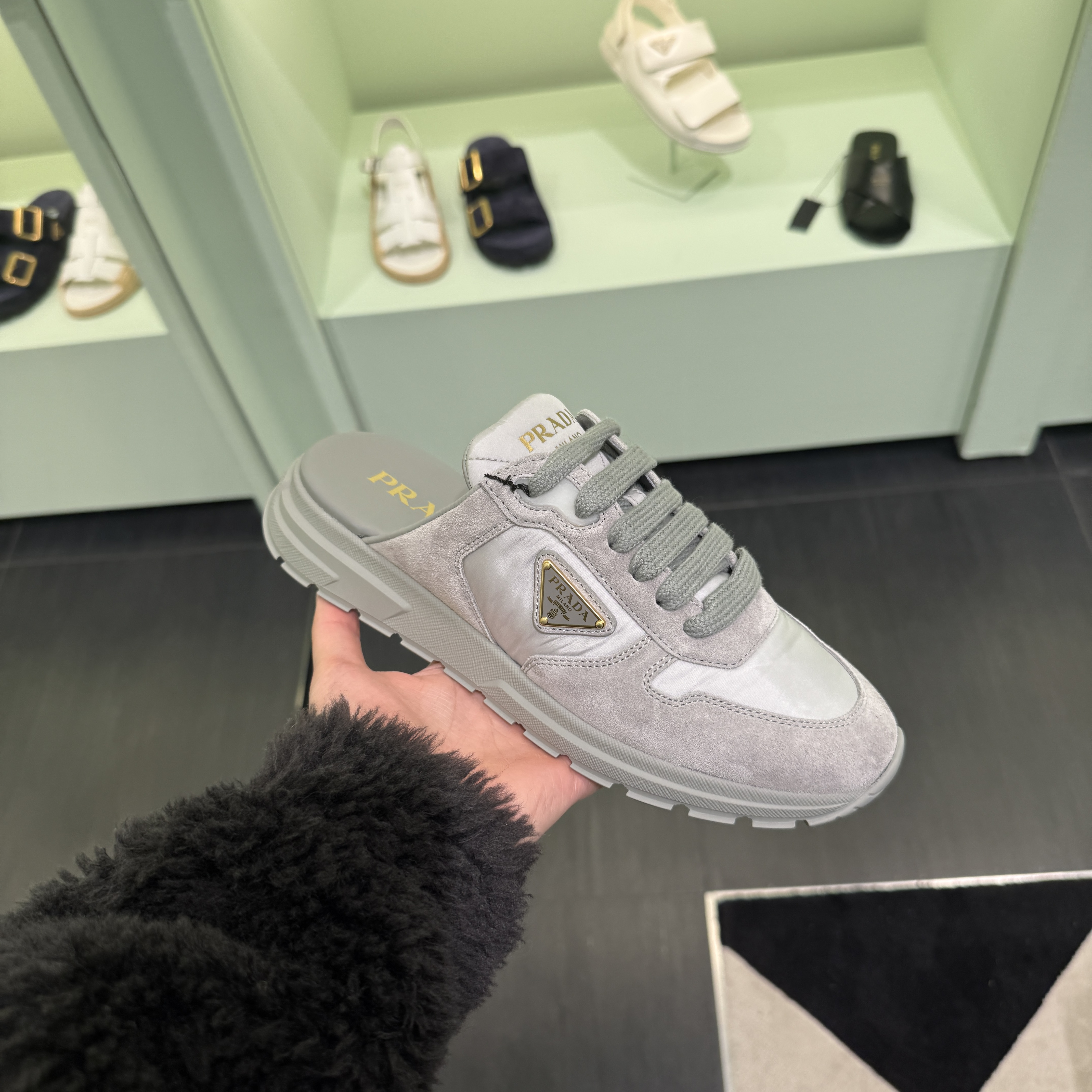 Prada logo sneakers mules