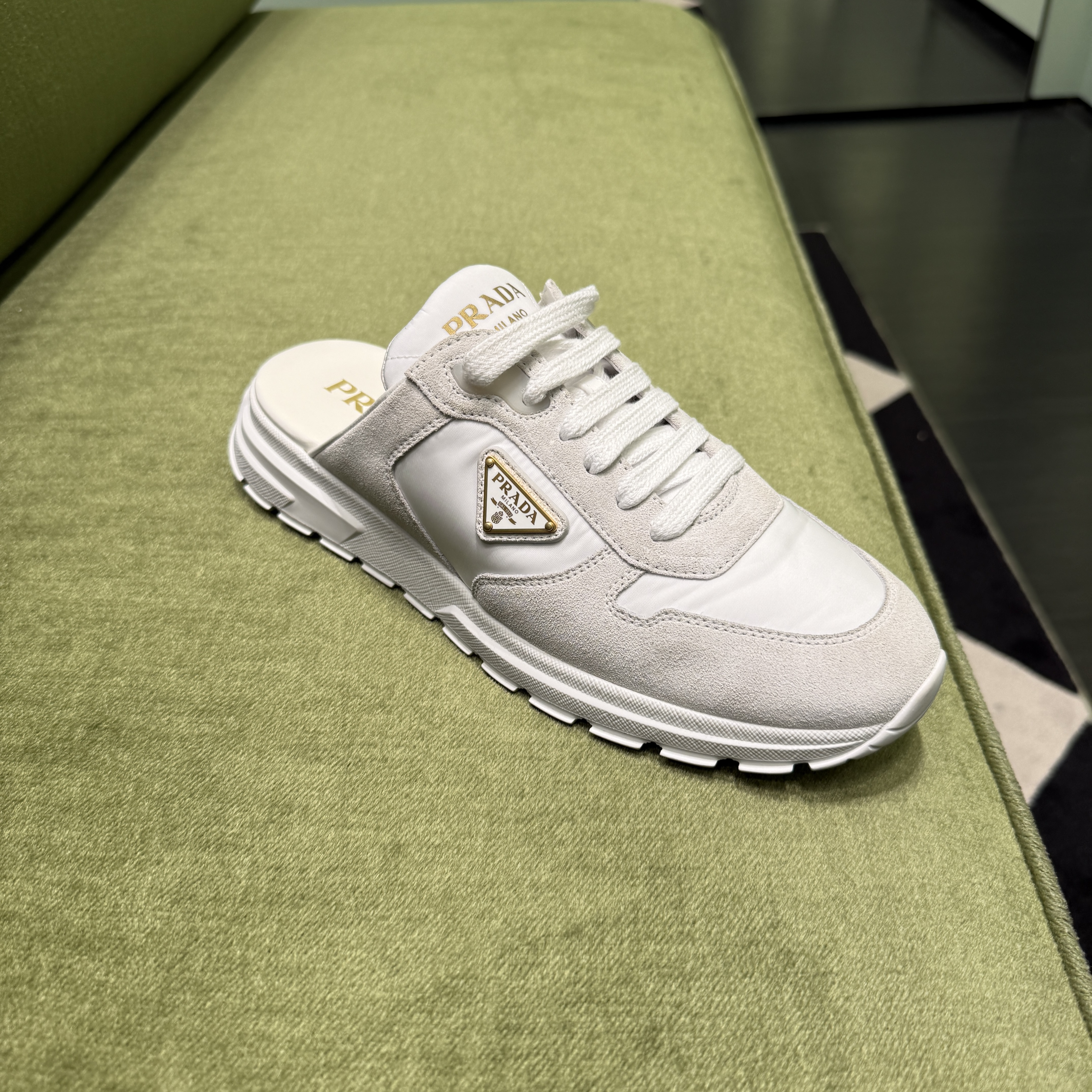 Prada logo sneakers mules