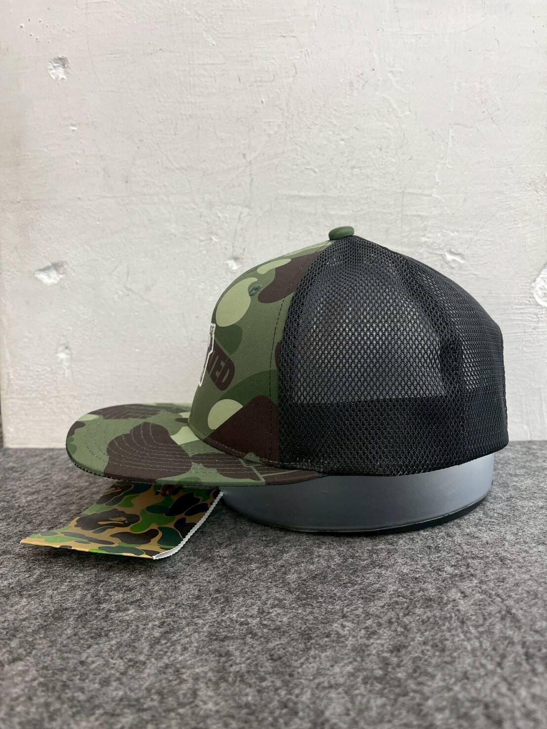 BAPE x Undefeated Color Camo Mesh Cap