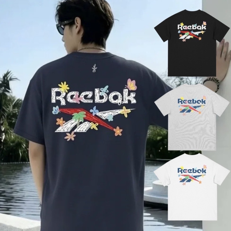 Reebok 美式復古卡通塗鴉LOGO 寬鬆短踢 26SRMC8NU