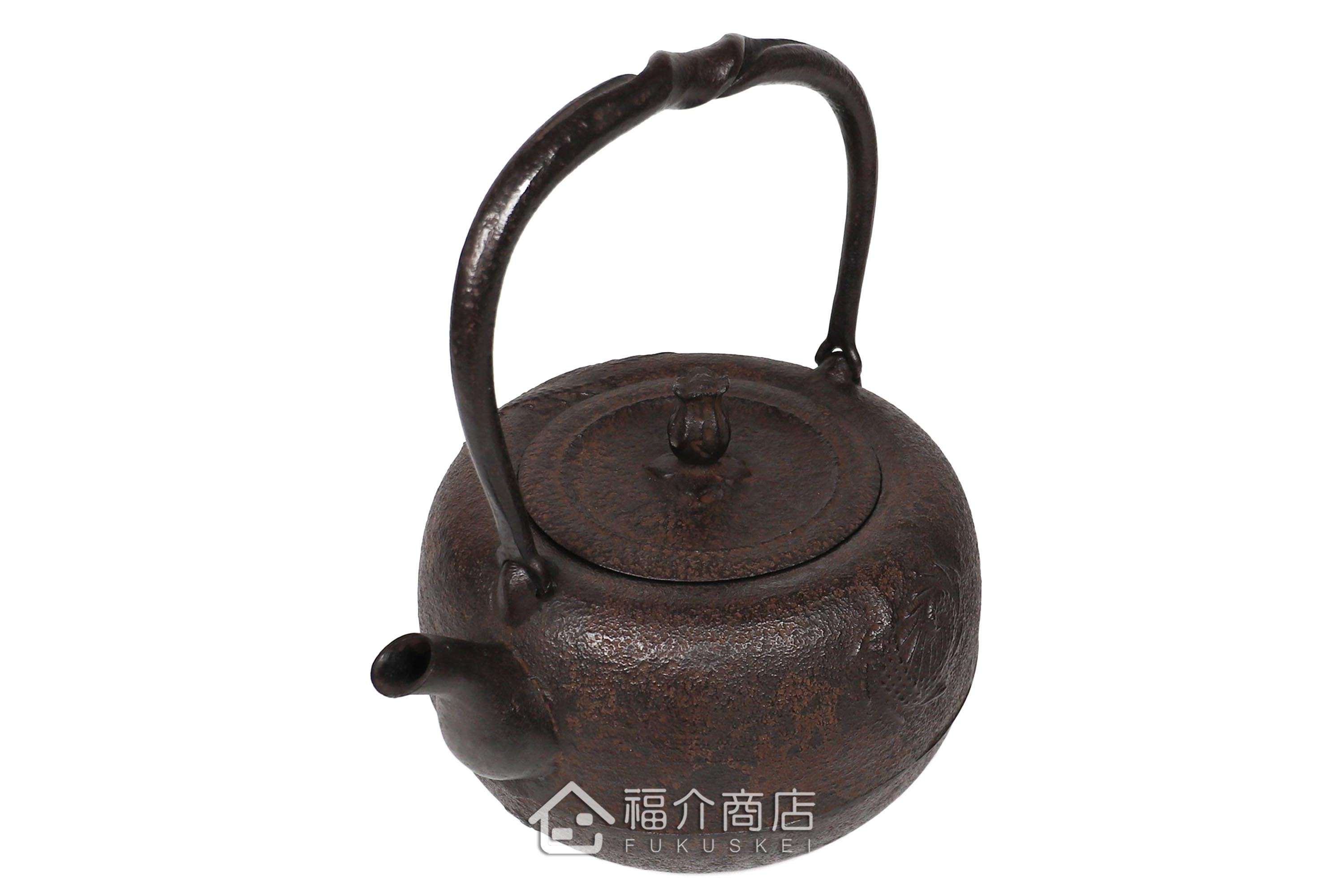 岩戶賢一郎所製作的日本鐵壺,壺身設計龍的圖紋