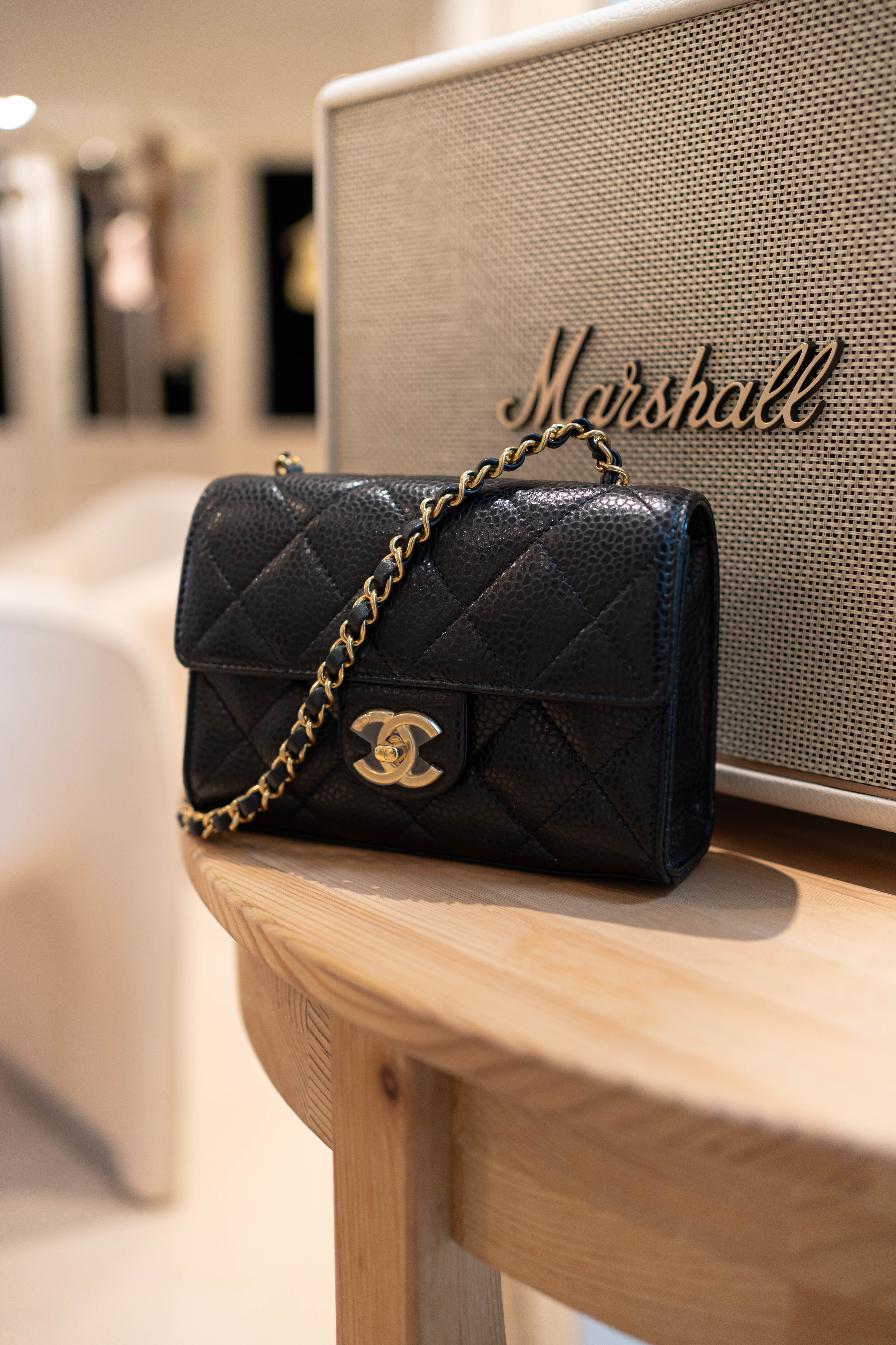 Chanel black mini flap black grained calfskin gold hardware