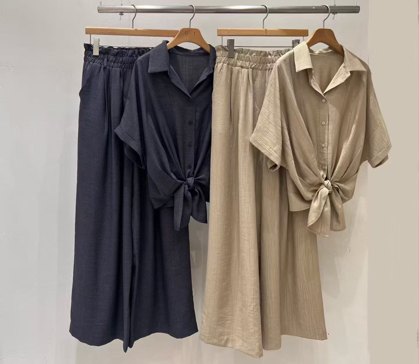 GI6204 綁結下擺暗紋排扣翻領上衣
