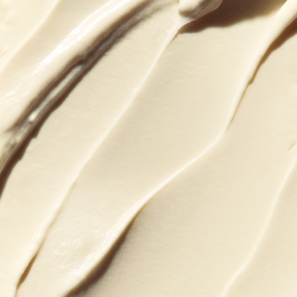 nomel Bbright Back Brightening Enzyme Whipped Mask texture close-up, gentle yellow tone from turmeric extract