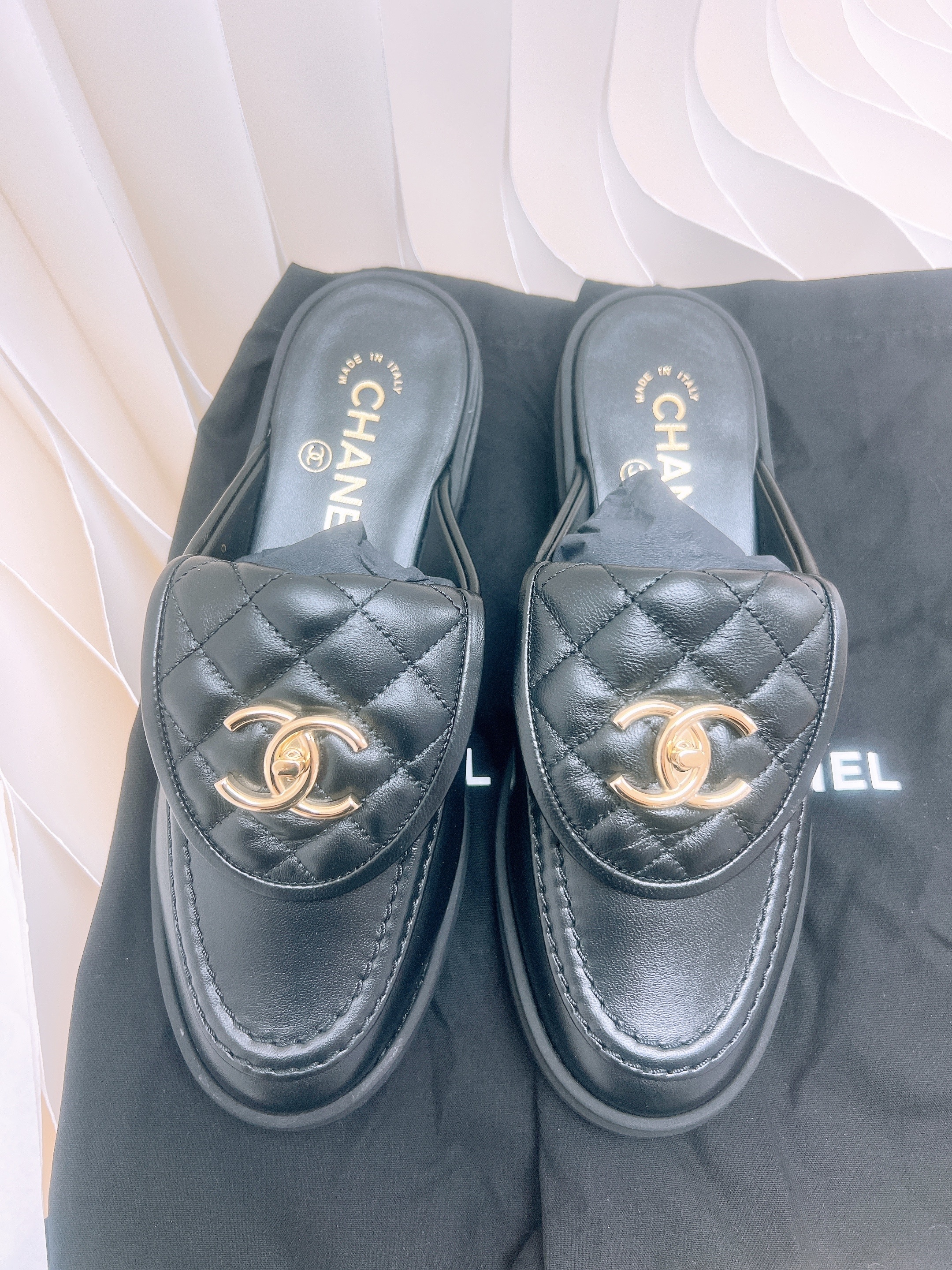 *Unused* Chanel quilted turnlock slip on loafers (black/ GHW)