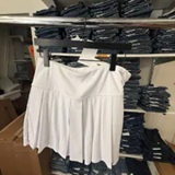 [S] DKNY WHITE EXTRA HIGH-RISE PLEATED TENNIS SKORT, P6K1012-WHT (SD2010)