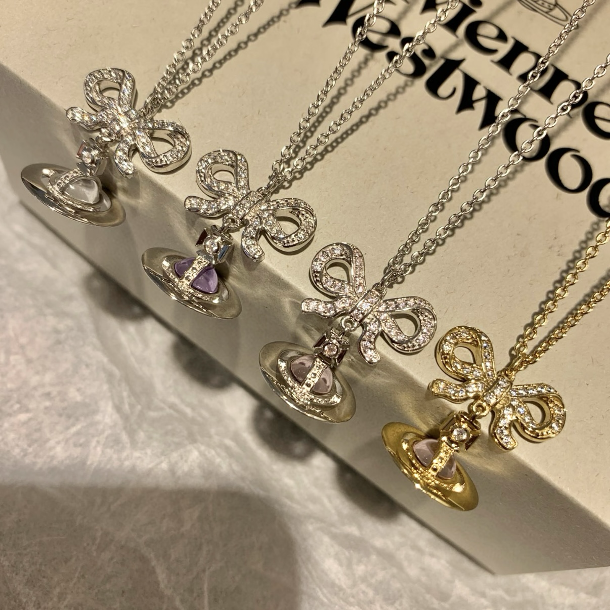 18k vivi”orb 蝴蝶結小星球土星墜項鍊/高奢定製