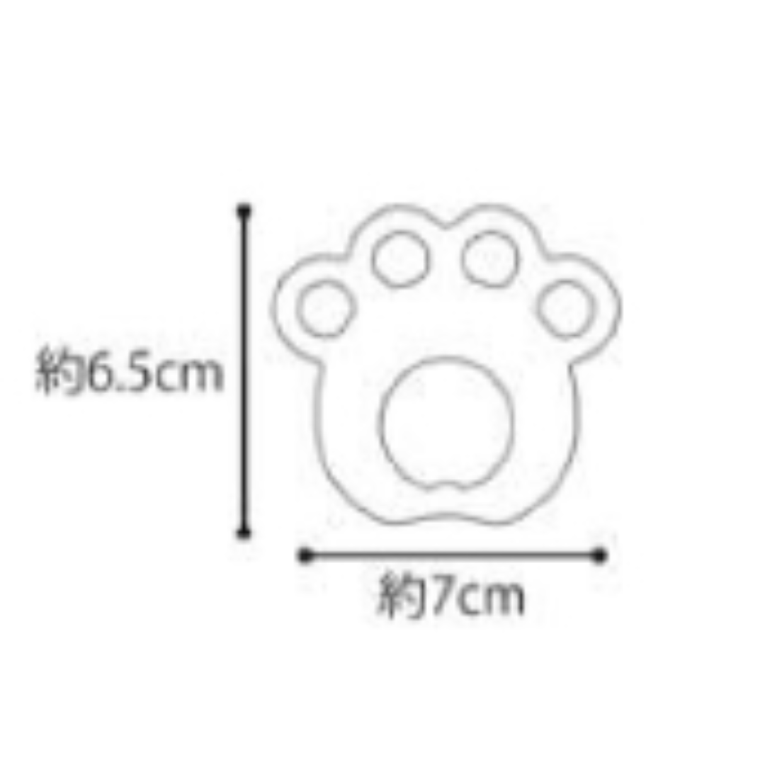 貓爪捏捏樂的產品尺寸與線條規格圖。圖中以簡約黑色外框線條描繪出貓咪肉球玩具的造型，並附加清晰的長度標記。左側垂直測量線標示其高度約為6.5cm，下方水平測量線則標示其寬度約為7cm。這張尺寸規格表能為計劃網購這款熱門減壓玩具香港用家提供精確的產品大細參考。