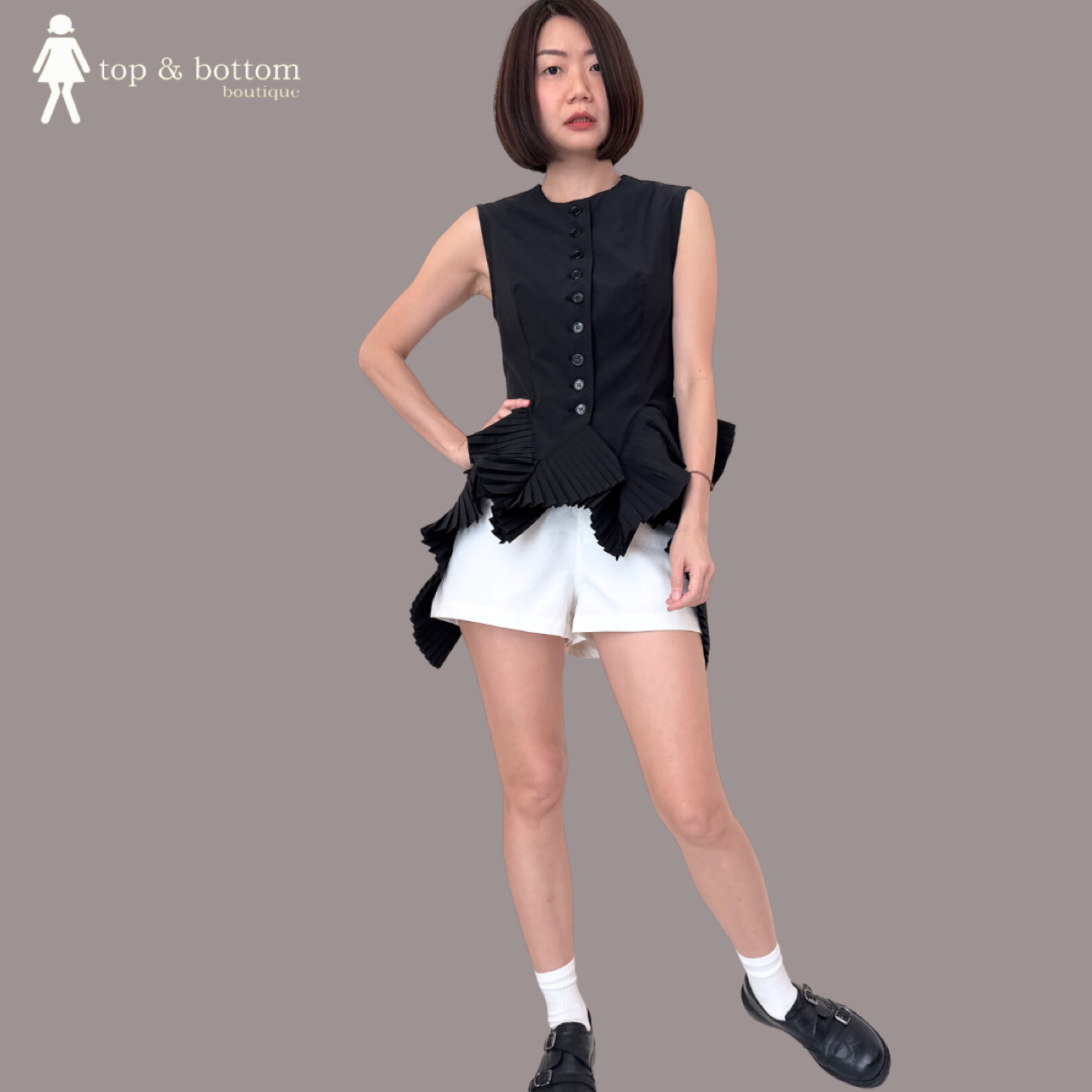 SLEEVELESS BUTTON BLOUSE WITH PLEATED HEM